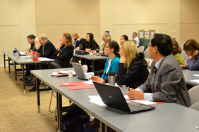 Program staff and audience at Panel meeting