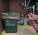 Spraying under kitchen sink