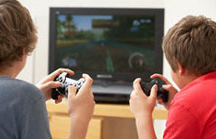 2 children playing video games